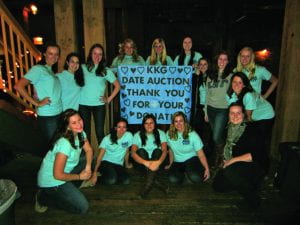 Women of Kappa Kappa Gamma posed after last year’s Date Auction to give thanks to those student who participated in both the date and silent auctions.