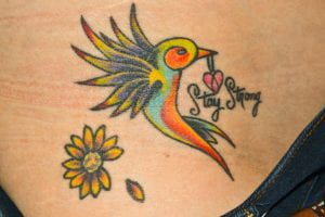 In a tattoo that can be found on Mady Thielemann’s hip, the hummingbird symbolizes a powerful combination of being “small but mighty.”