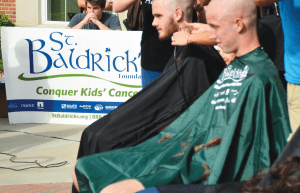 Students sign up each year to get their heads shaved in an effort to raise money for the St. Baldricks Foundation. The event is hosted by the Phi Kappa Tau fraternity.