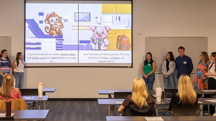 A group of students presents a group project during the spring 2026 Dean's Seminar.