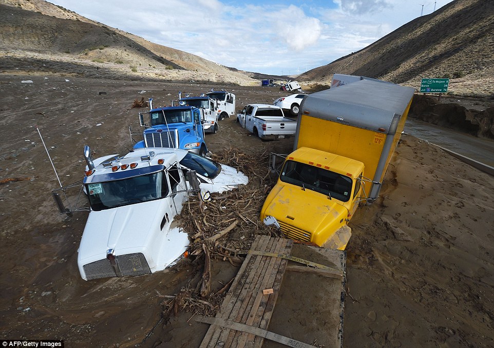 2D7C78F200000578-3276801-Disaster_Seventy_five_tractor_trailers_and_two_tour_buses_were_a-a-2_1445049422972