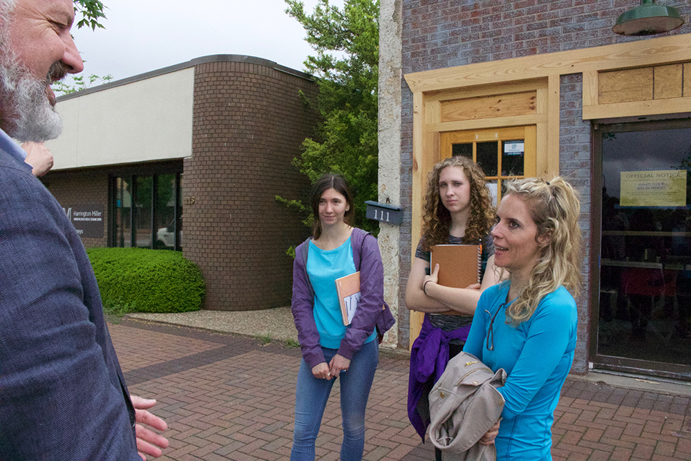 Group visits in downtown Springdale. 