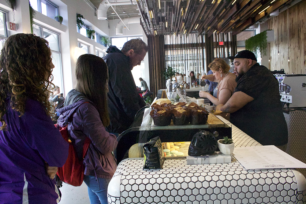 The group takes a break in a stylish coffee bar. 