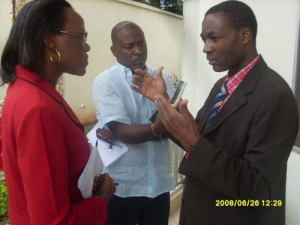 Christophe Bobda, speaking to a woman and a man