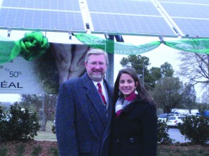 Mantooth and Mueller in front of the solar arrays at L'Oreal.