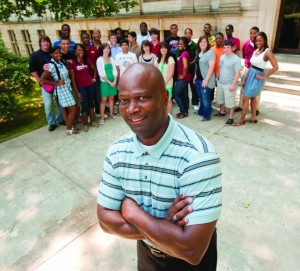 a group of students and a college staff member