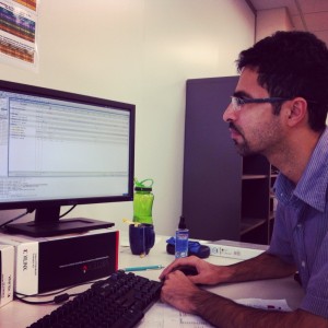 a student sitting in front of a computer