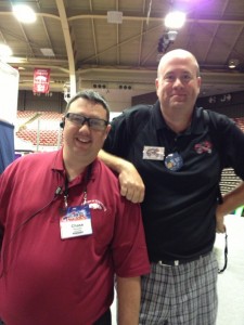 two men standing in a stadium