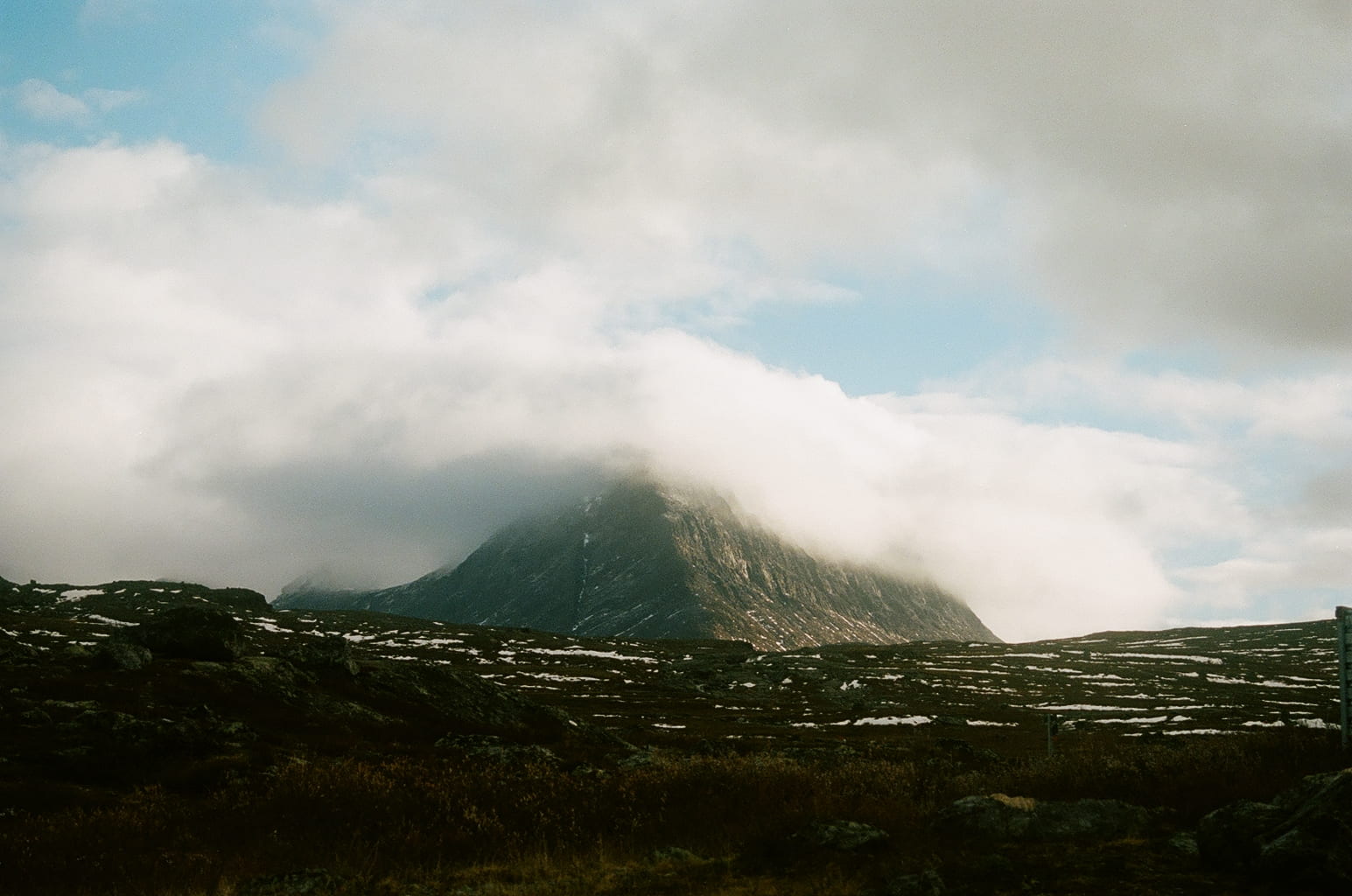 mountains covered in mist