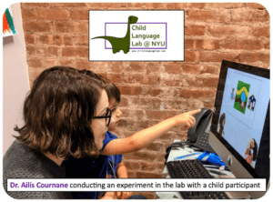 Dr. Cournane conducting an experiment with a child in the lab at NYU