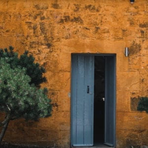 a door on a brick wall