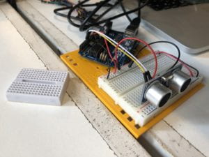 Testing out our distance sensors with the Arduino and the P5.js sketch to make sure it worked before building the mirror.