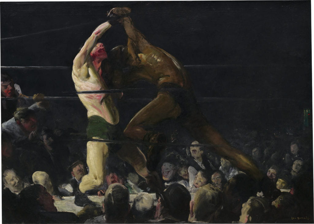 George Bellows painting, Both Members of This Club, shows two boxers, one Caucasian, one African American, fighting as a crowd of eager spectators look up at their large-scale figures. The Caucasian boxer on the left is pushed backwards, bleeding from the mouth, as the African American boxer lunges forward in attack from the right. The painting’s background is entirely black, while the boxers and faces of some members of the crowd are illuminated in spotlight. 