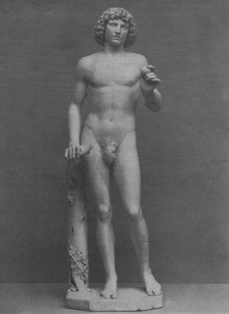 Sculpture of a standing male nude.