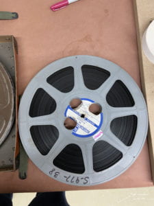 Reel of film that has been given mold remediation treatment.