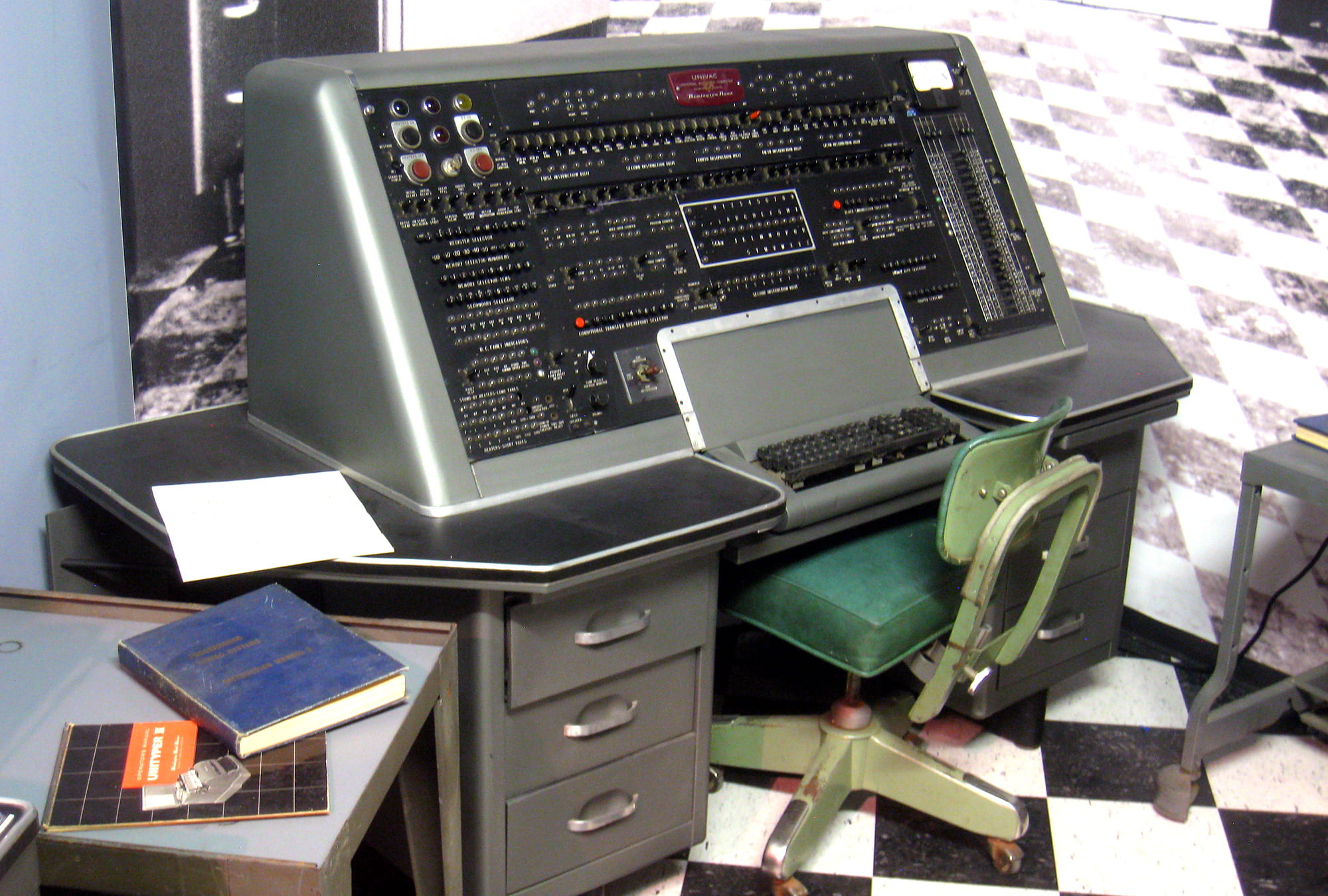 An old univac control console on display in a museum