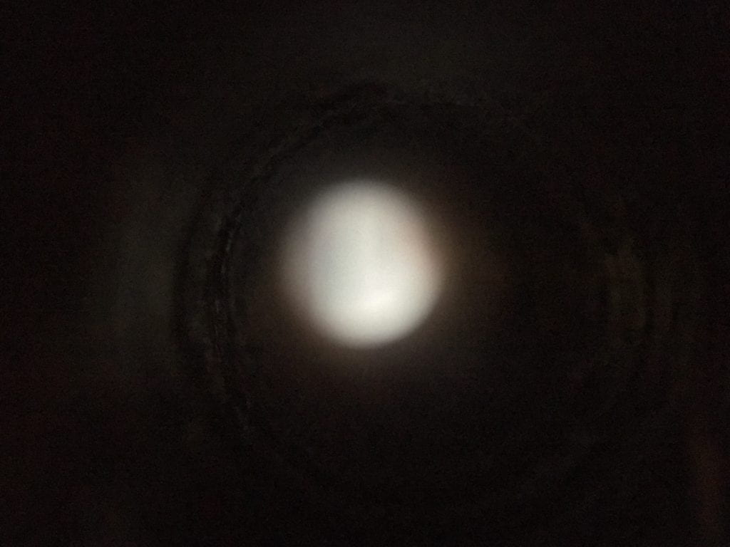 Blurry image of hole.