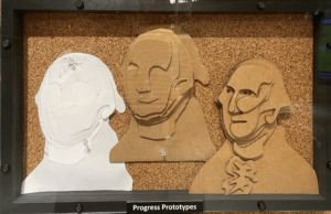 3 Prototypes of old George Washington: paper pattern version, cardboard cutout of pattern version, and laser cut version