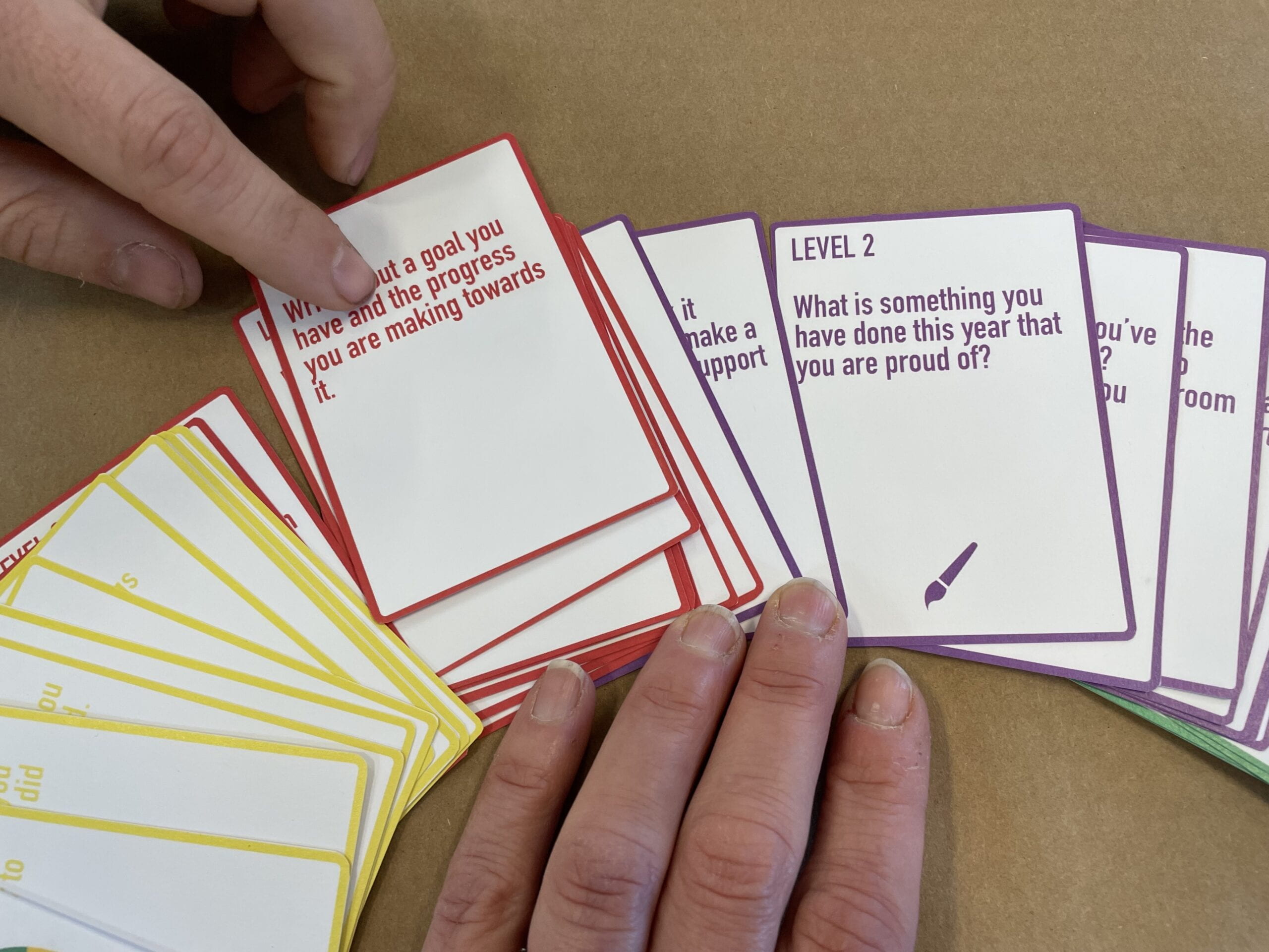 Photograph of individual cards from colored deck