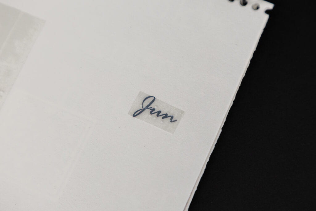 Text saying 'Jun' with clear braille label on top