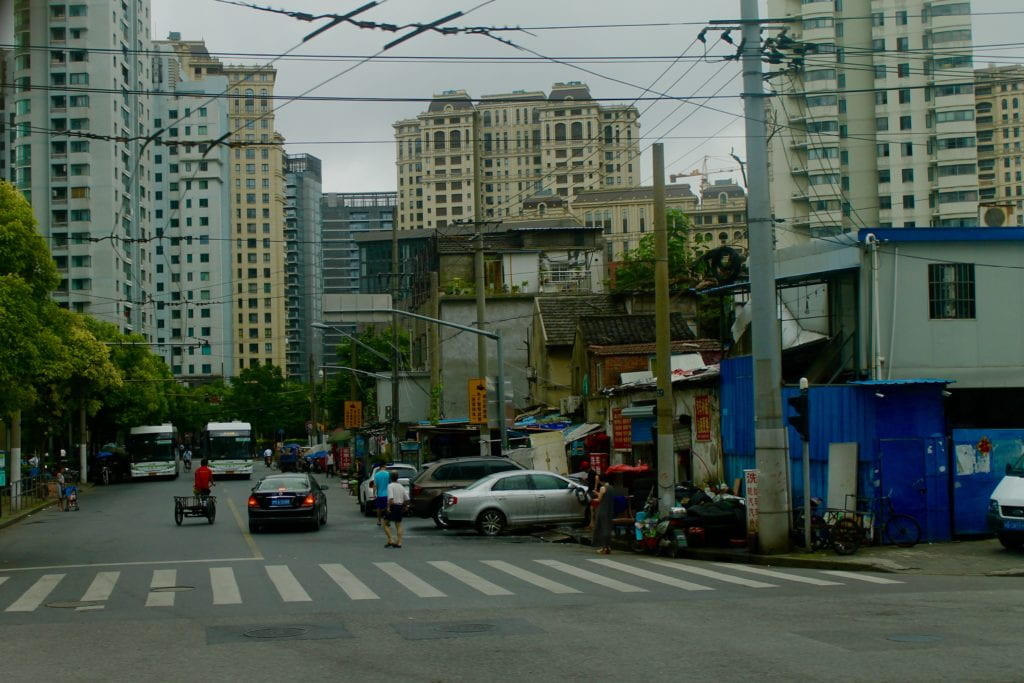 Shanghai's oldest neighborhood, older tall buildings in the distance. 