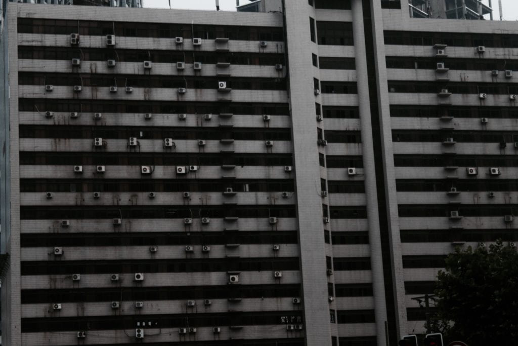 tall  building with many air-conditioners