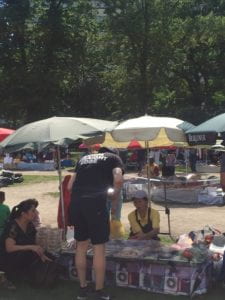 man shopping at food stalls