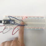 a breadboard with a LED circuit