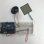 a circuit connected with Arduino, speaker and FSR