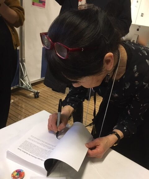 Ikuko writes in a book