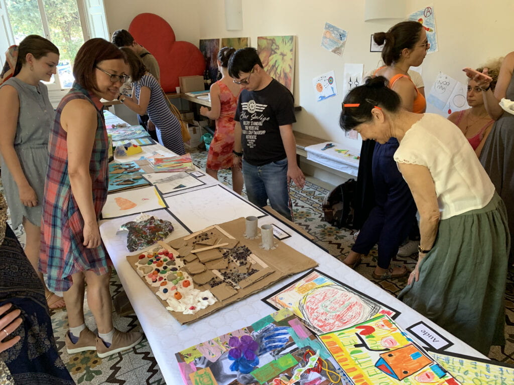 Ikuko and students share food at a study abroad event