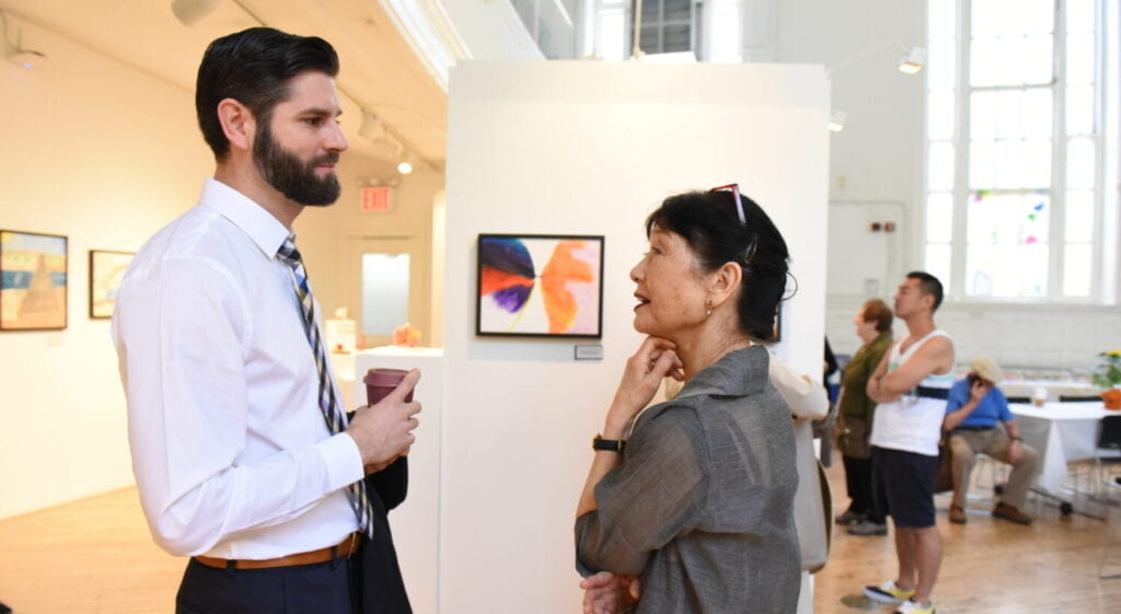 Ikuko speaks to a student