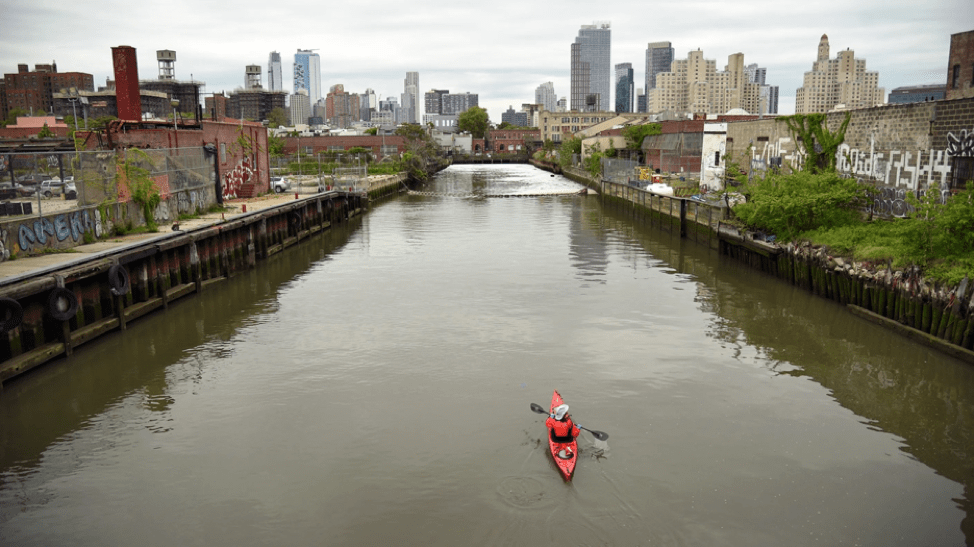 Kayaker along Gowanus Canal. Credit: Gowanus Dredgers Canoe Club