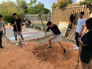 Student digging