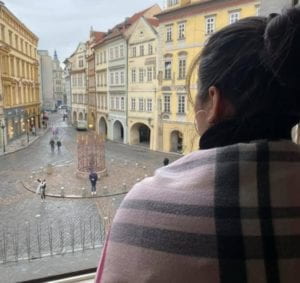 woman looking at Prague