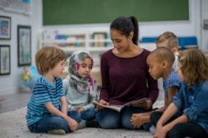 researcher with children