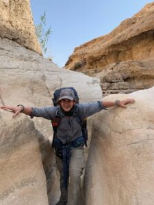 Andrew Califf standing in a rock crevice