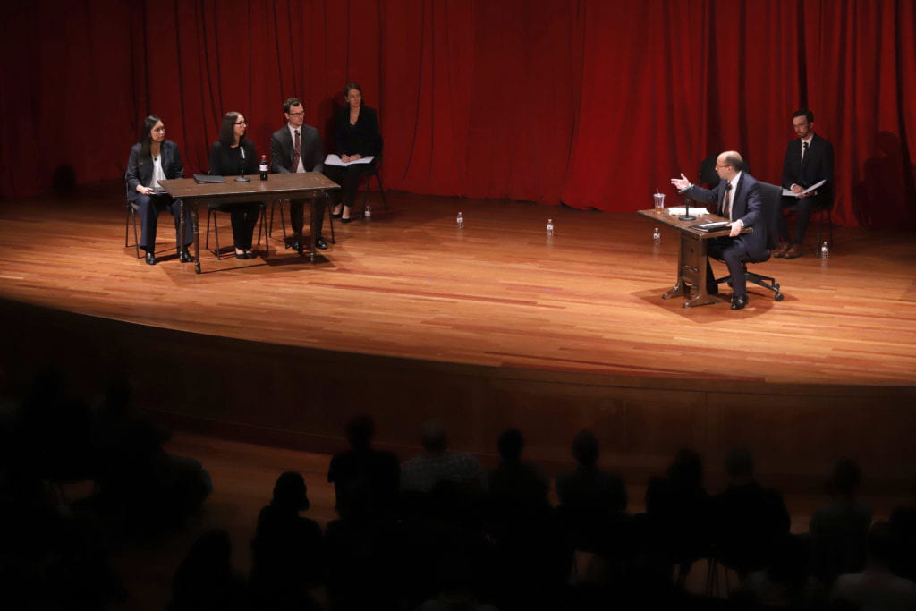 Actors from the Verbatim Performance Lab performing a scene from The Kavanaugh Files on a stage.