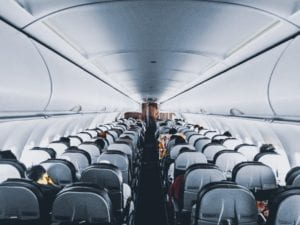 an overhead view of passengers on an airplane