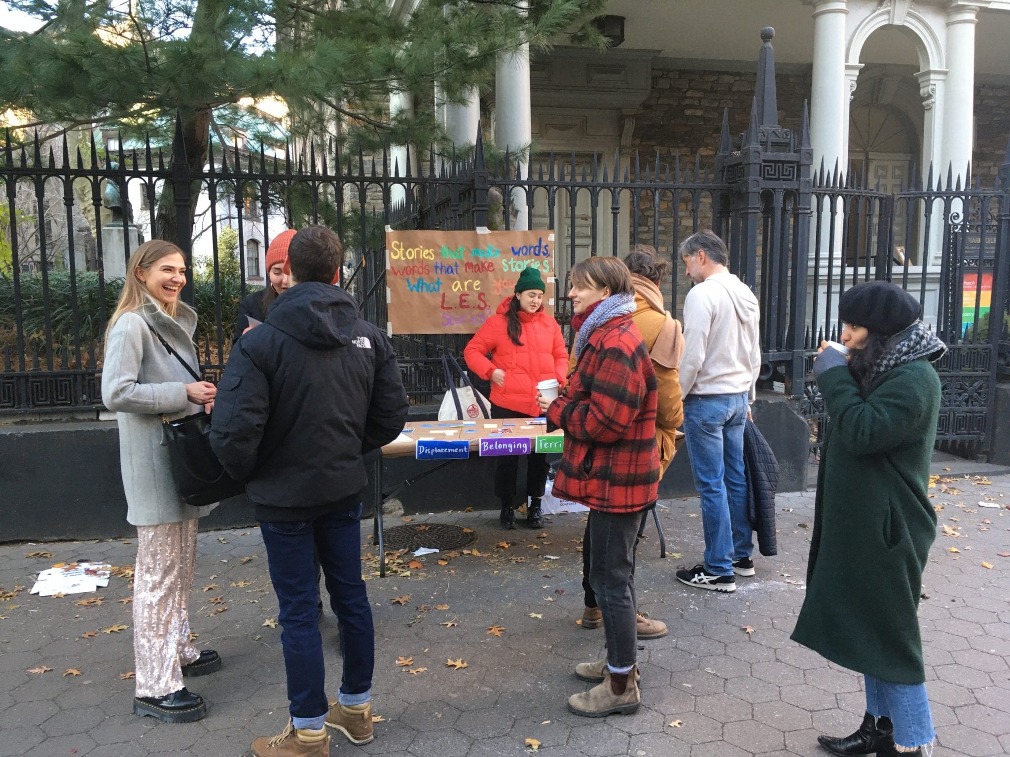 Grad students talking with people that stopped at their workshop table.