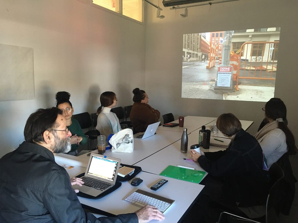 Avram Finkelstein of Gran Fury and students during a flash collective.