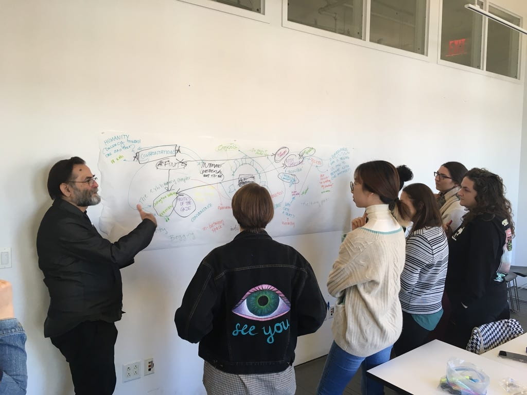 Avram Finkelstein of Gran Fury and students during a flash collective.