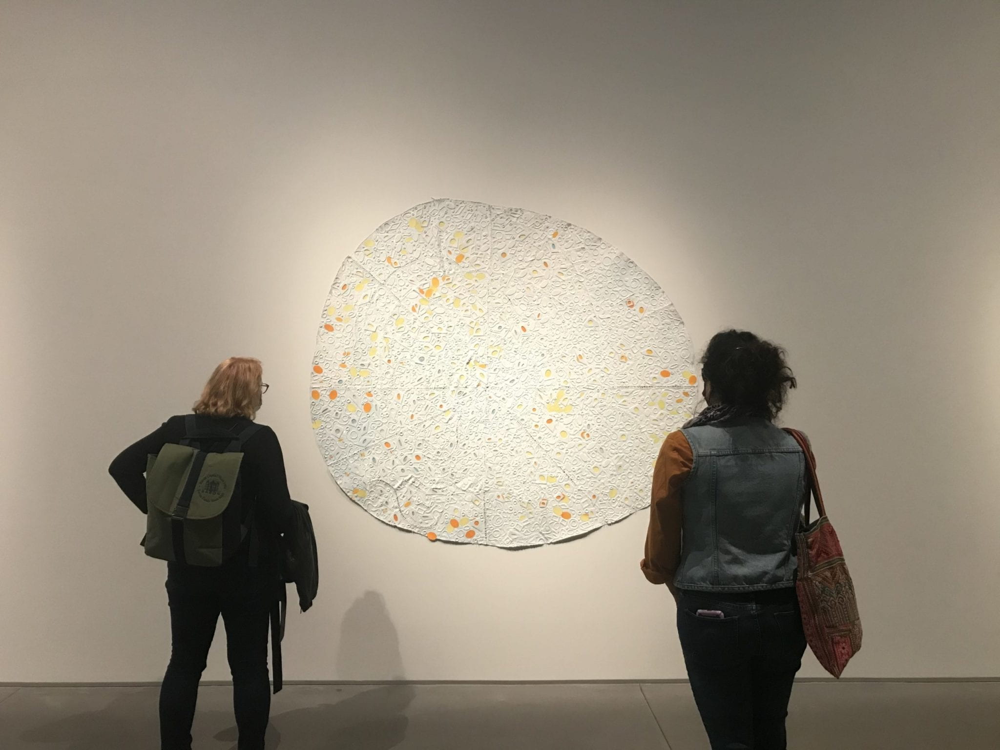 Students looking at Paper and textile artwork by Howardena Pindell exhibition, Rope/Fire/Water at The Shed