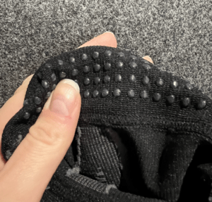 Detail view of the rubber-like dots that keep the compression sleeve up.