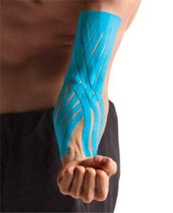 Turquoise tape on a man's flexed forearm.