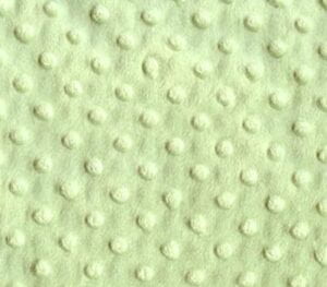 Raised dots on soft-looking green fabric