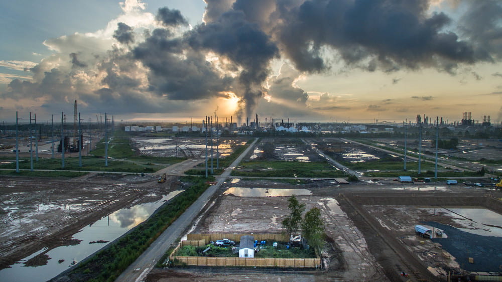 Photo f the chronically polluted industrial skyline of Mossville, near Lake Charles in Calcasieu Parish by Alexander John Glustrom 