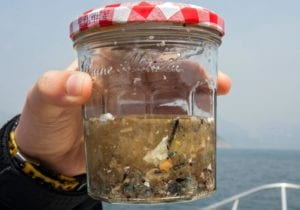 A jar of microplastics collected from the ocean