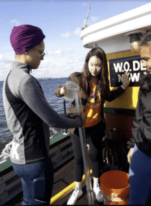 participants in the Nature at the Water's Edge program on a boat