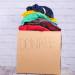 box of clothing labeled: "Donation"